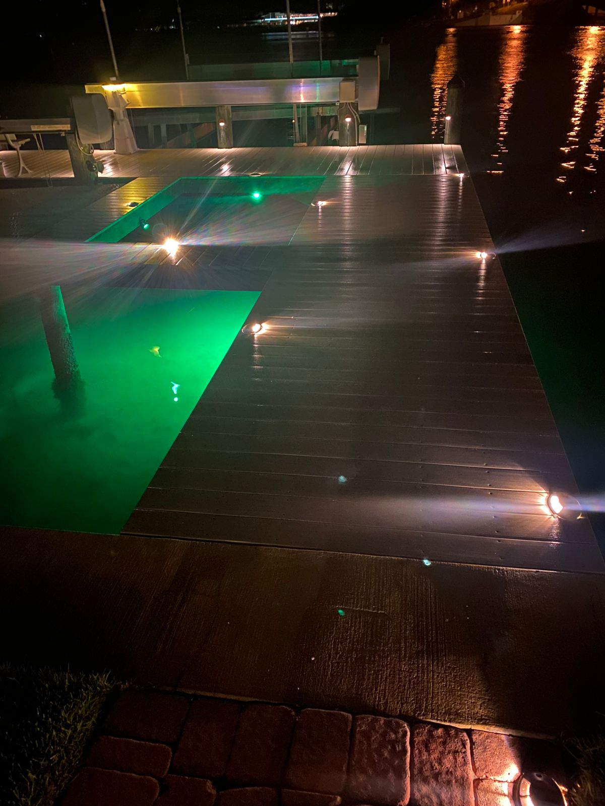 Dock with underwater green lighting